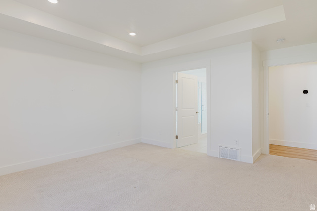 433 North 600 West Smithfield, UT 84335 - Photo 30 of 40 Recessed lighting illuminates a tray ceiling and light-colored carpeting