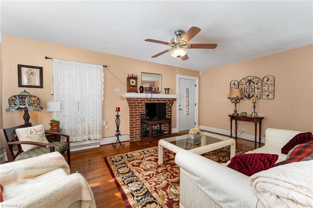 722 Forrest Street High Point, NC 27262 - Photo 16 of 28 Large living area with hardwood floors throughout