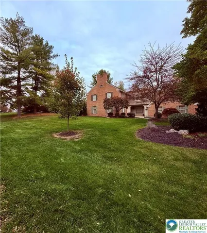 a kitchen with kitchen island a counter top space appliances and a counter top space