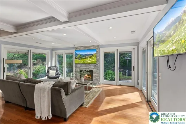 a bedroom with a bed and a fireplace