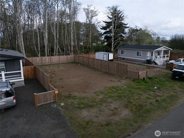 a view of backyard with trees