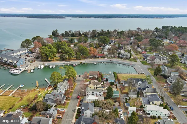 an aerial view of a house with a lake view