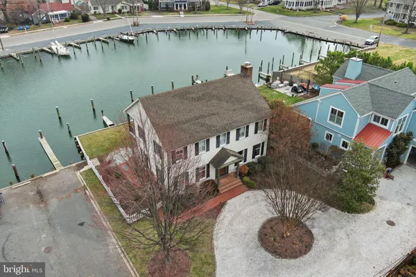 an aerial view of a house with outdoor space