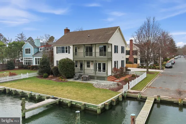 a view of a house with swimming pool
