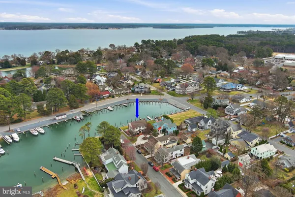 an aerial view of a city with lake