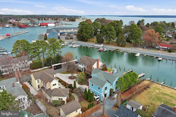 a view of a lake with houses with outdoor space and lake view