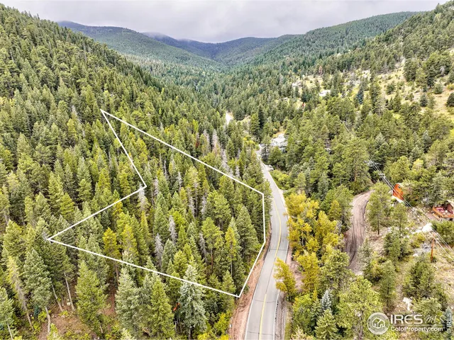a view of a mountain with an outdoor space