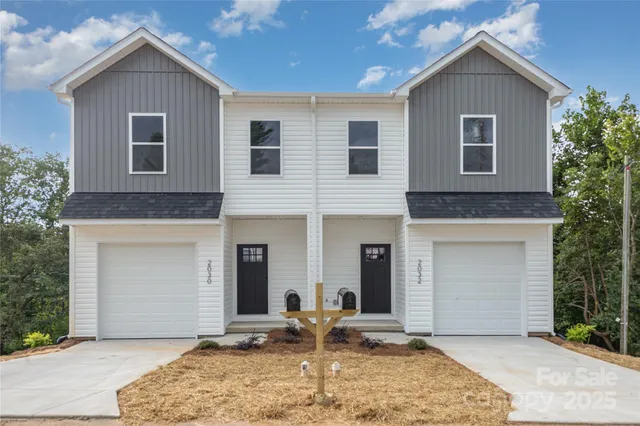 a backyard of a house with seating space