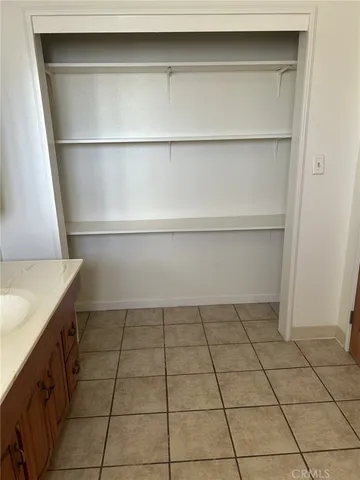 a view of an empty room with a sink