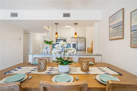 a view of a dining room with furniture