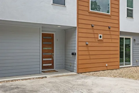 a front view of a house with a garage