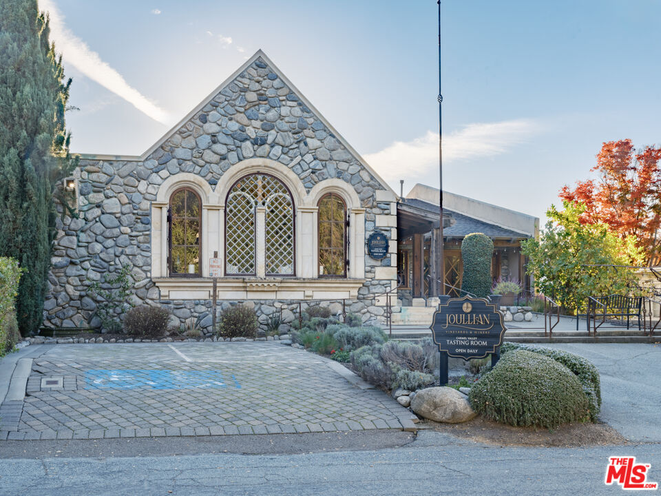 20300 Cachagua Road Carmel Valley, CA 93924 - Photo 12 of 37 a front view of a house with garden