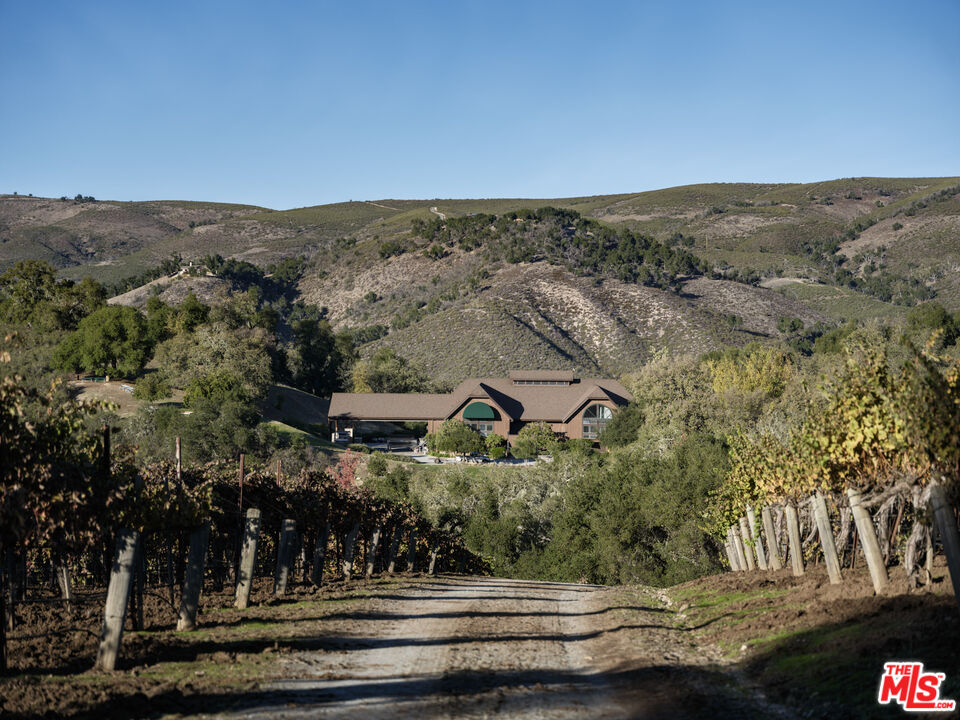 20300 Cachagua Road Carmel Valley, CA 93924 - Photo 21 of 37 an aerial view of houses with yard