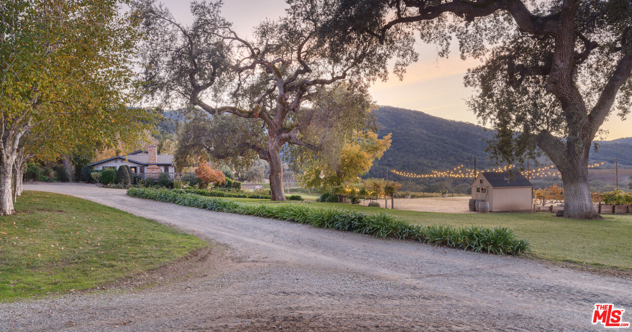 20300 Cachagua Road Carmel Valley, CA 93924 - Photo 7 of 37 a front view of house with yard and green space