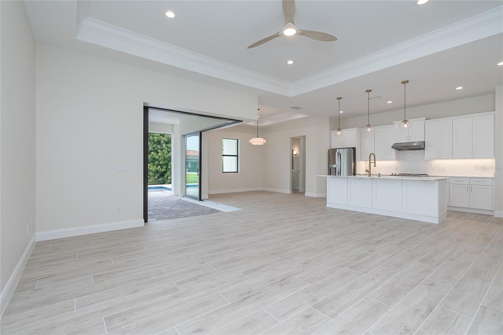 191 Tournament Road Rotonda West, FL 33947 - Photo 15 of 41 a view of a kitchen with a sink and a window