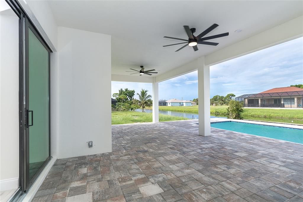 191 Tournament Road Rotonda West, FL 33947 - Photo 17 of 41 a view of a garden from a windows