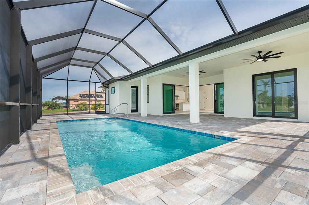 191 Tournament Road Rotonda West, FL 33947 - Photo 38 of 41 a view of a porch with a garden