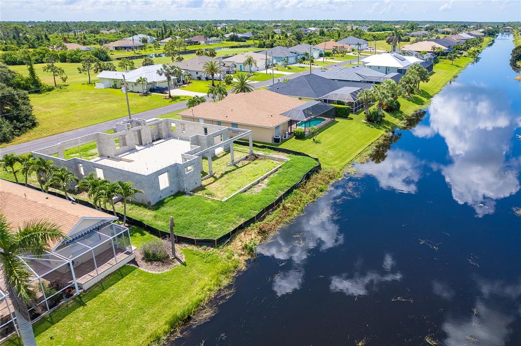 191 Tournament Road Rotonda West, FL 33947 - Photo 7 of 41 an aerial view of a house with a ocean view