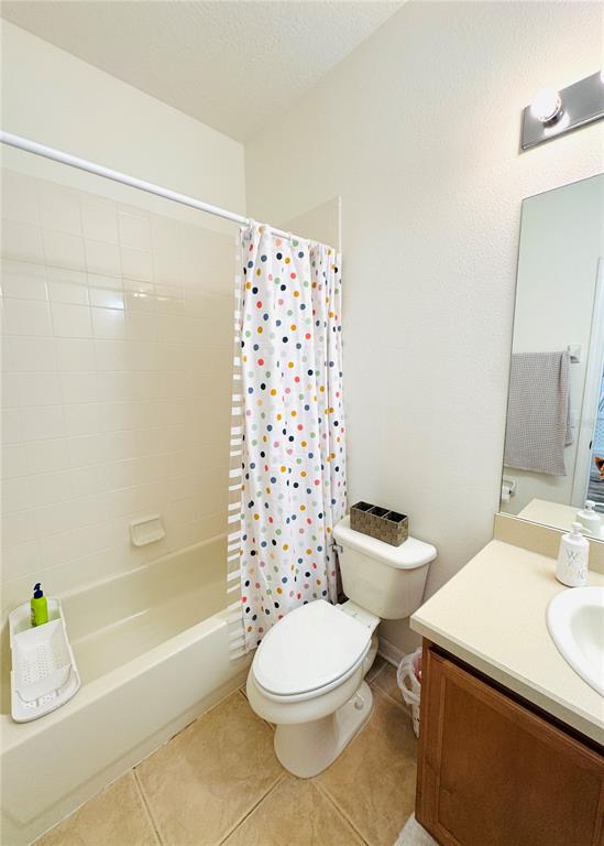 3660 Wilshire Way Road, Unit 260 Orlando, FL 32829 - Photo 18 of 25 a bathroom with a sink a toilet and shower