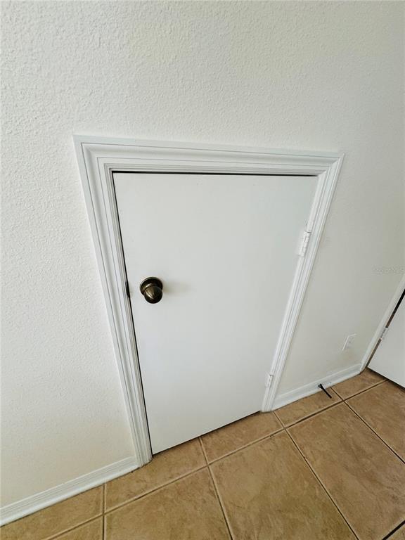 3660 Wilshire Way Road, Unit 260 Orlando, FL 32829 - Photo 19 of 25 an empty room with wooden floor