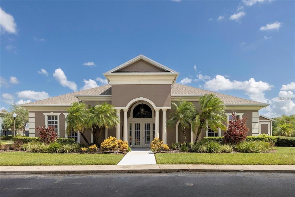 3660 Wilshire Way Road, Unit 260 Orlando, FL 32829 - Photo 21 of 25 a front view of a house with garden