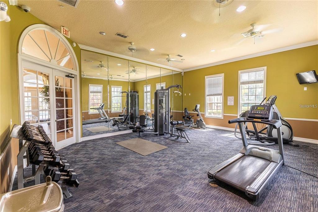 3660 Wilshire Way Road, Unit 260 Orlando, FL 32829 - Photo 25 of 25 a view of a room with gym equipment