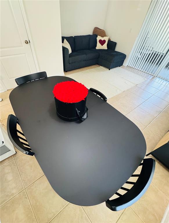 3660 Wilshire Way Road, Unit 260 Orlando, FL 32829 - Photo 6 of 25 a bedroom with a bed and a couch