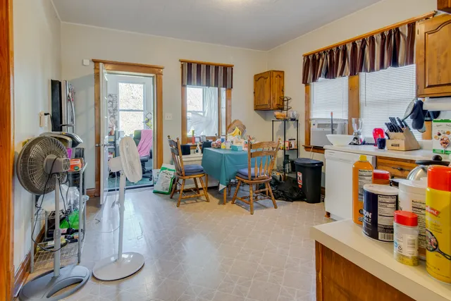 a room with gym equipment and a large window