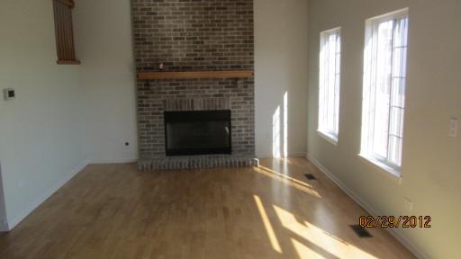 1663 Cesario Drive Hampshire, IL 60140 - Photo 5 of 14 a view of an empty room and window
