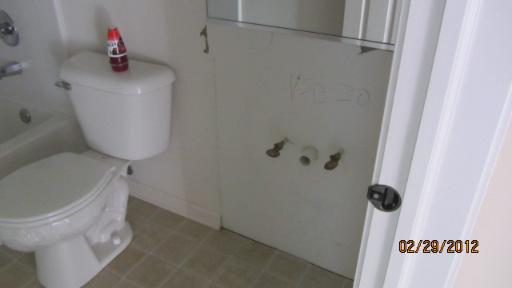 1663 Cesario Drive Hampshire, IL 60140 - Photo 9 of 14 a bathroom with a toilet and a sink