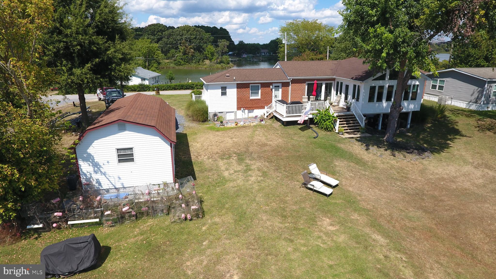 38819 Morris Point Road Abell, MD 20606 - Photo 8 of 36 Sunroom off the back of house too!
