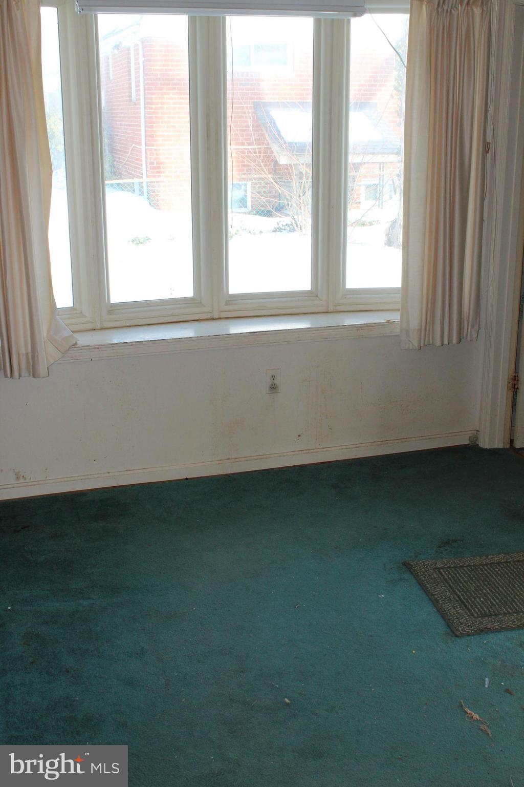 6815 Rolling Road Springfield, VA 22152 - Photo 18 of 22 an empty room with a window