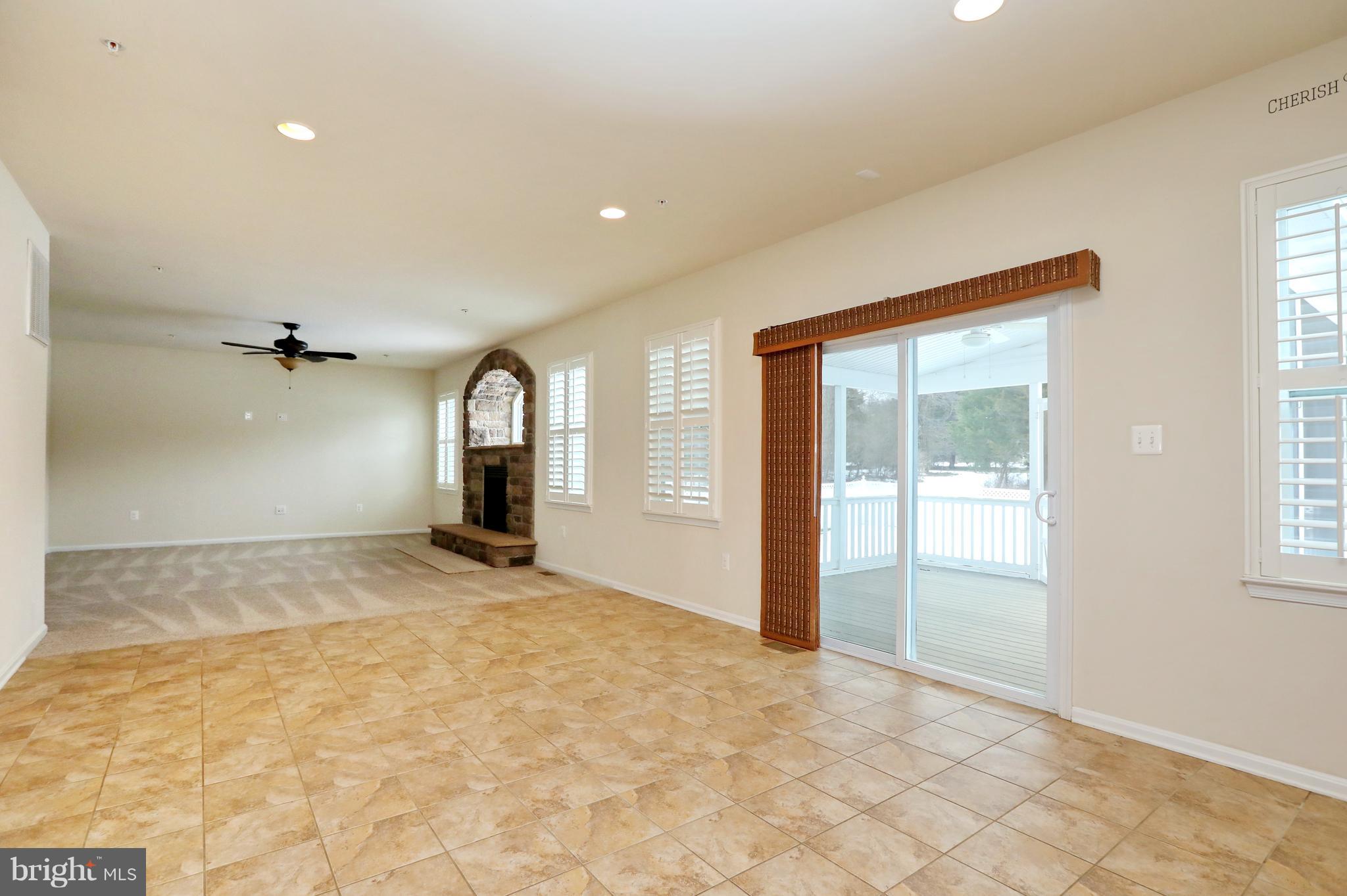 7580 Knotting Hill Lane Port Tobacco, MD 20677 - Photo 13 of 30 a view of a livingroom with a staircase