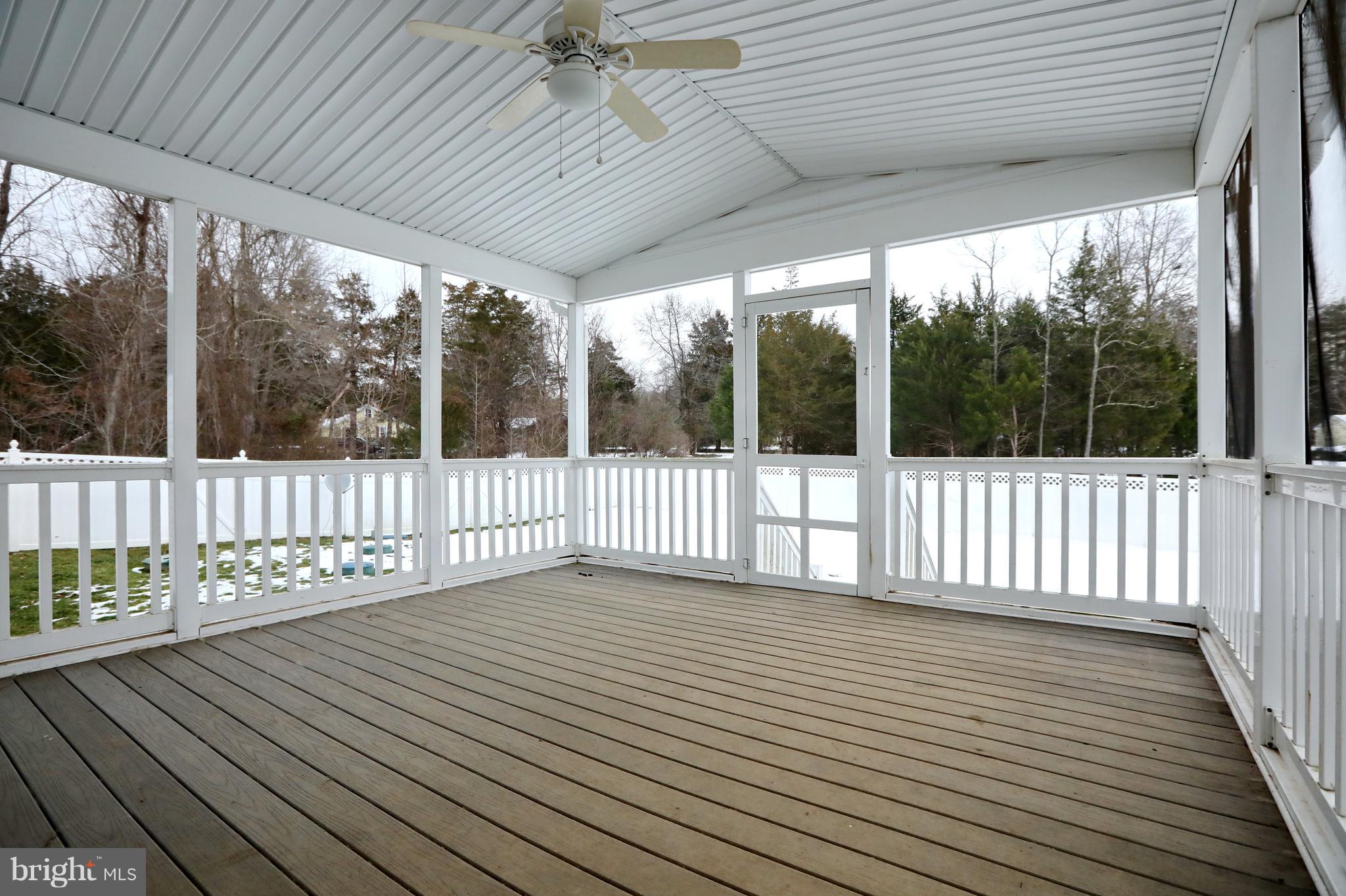 7580 Knotting Hill Lane Port Tobacco, MD 20677 - Photo 5 of 30 a view of a wooden deck