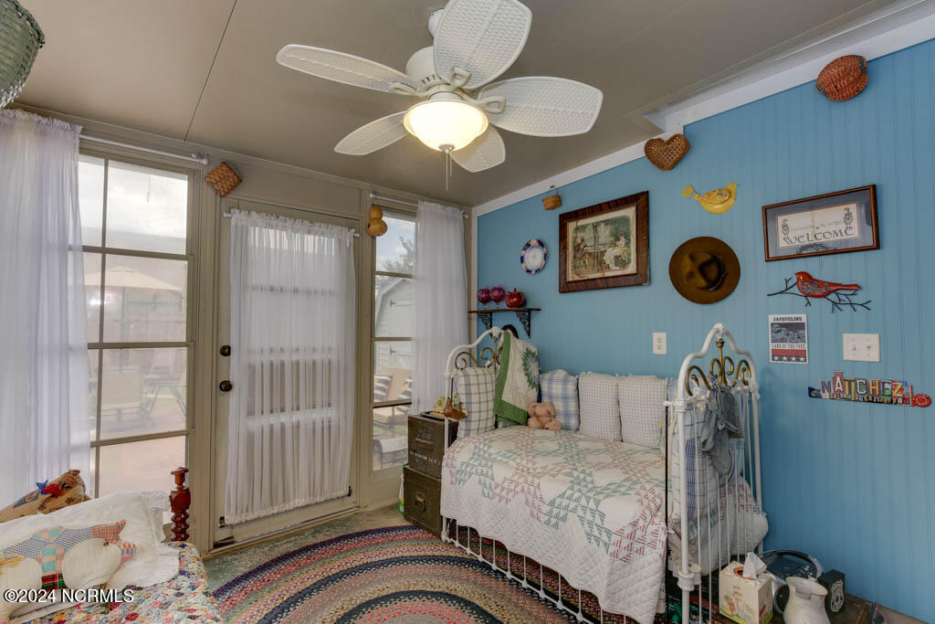 112 Old Oak Road Elizabeth City, NC 27909 - Photo 14 of 18 State-of-the-art telescoping windows, it can be transformed into a screened porch for breezy days, while the air conditioner and heater ensure comfort in any season
