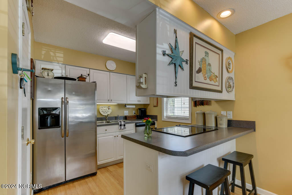 112 Old Oak Road Elizabeth City, NC 27909 - Photo 6 of 18 Pantry and stainless steel appliances