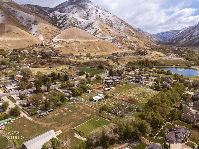 2672 East Canyon Road Springville, UT 84663 - Photo 17 of 33 Aerial view of residential area with a water and mountain view