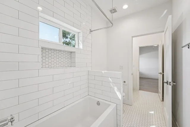 a bathroom with a bathtub