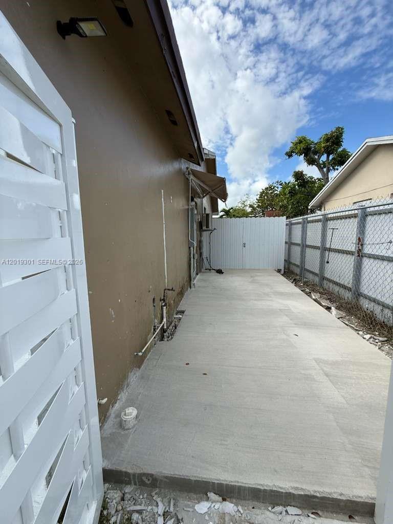25948 Southwest 132nd Avenue, Unit 1 Homestead, FL 33032 - Photo 6 of 6 a view of a backyard