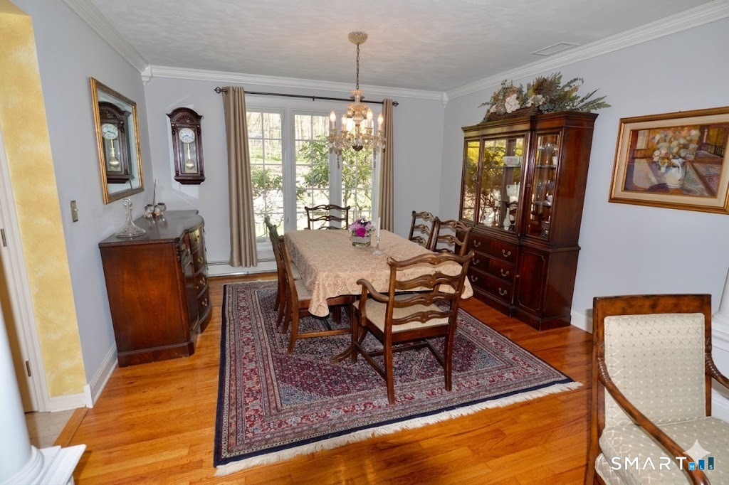 78 Mill Brook Terrace Monroe, CT 06468 - Photo 10 of 27 Hardwood floors, tall windows, crown molding