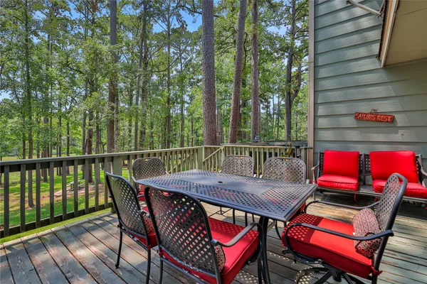 a view of a balcony with furniture