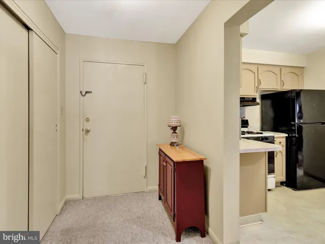 a view of a kitchen with electric appliances