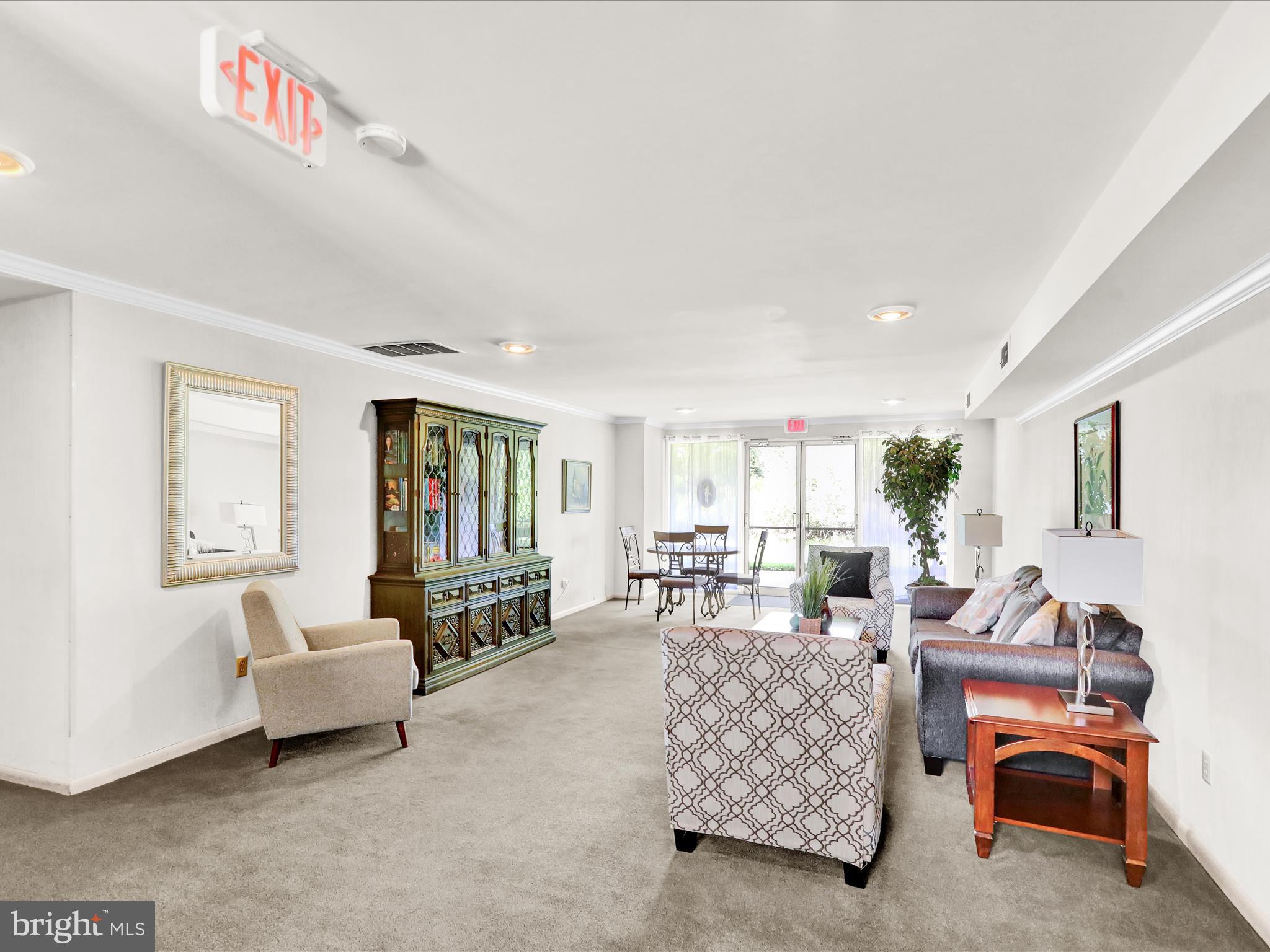 1801 Cambridge Avenue, Unit B4 Wyomissing, PA 19610 - Photo 25 of 27 a living room with furniture and a flat screen tv