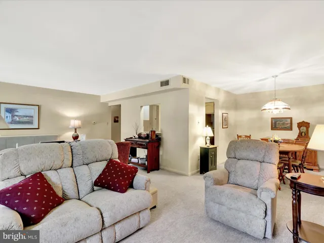 a living room with furniture and a couch