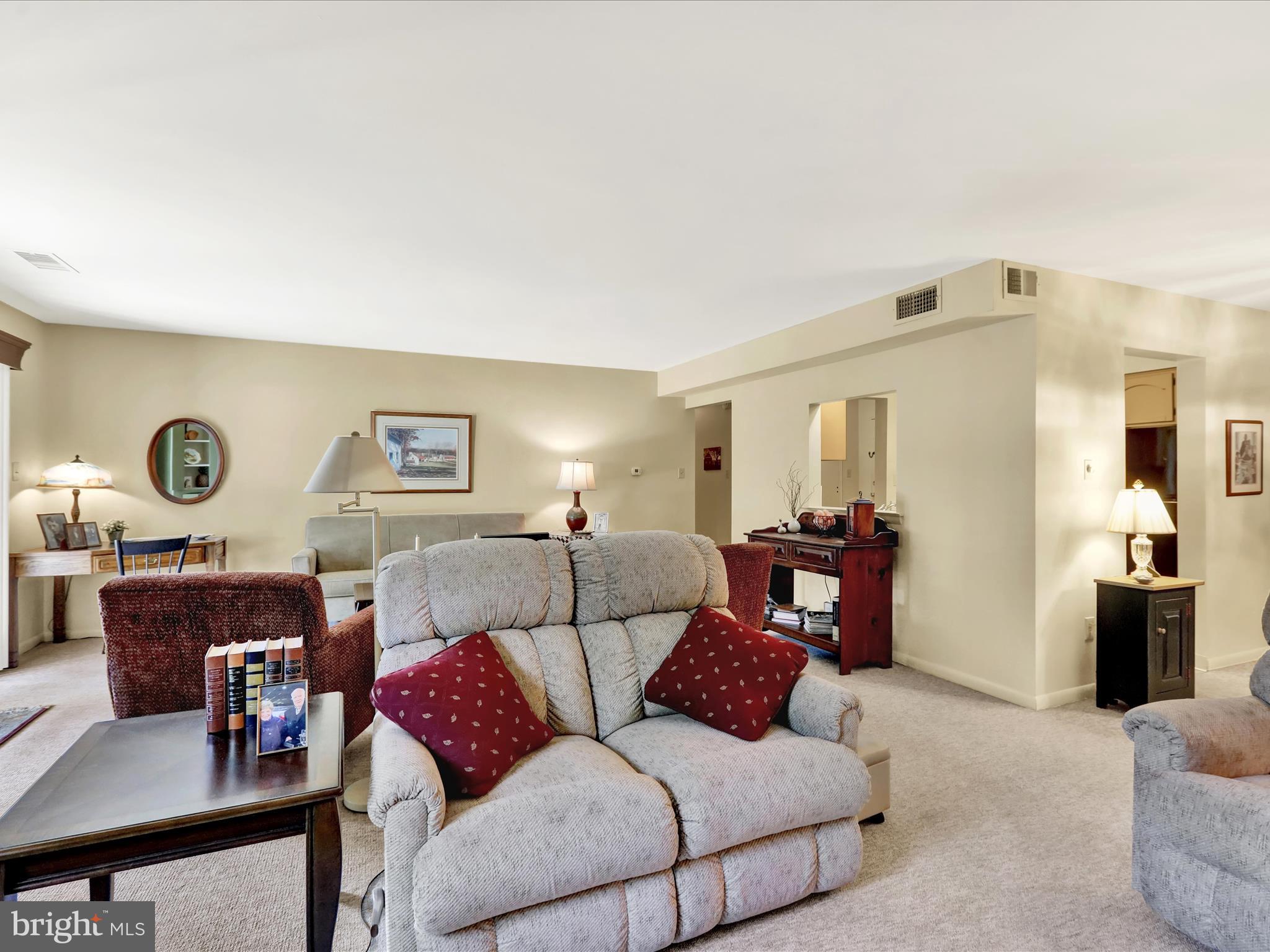 1801 Cambridge Avenue, Unit B4 Wyomissing, PA 19610 - Photo 7 of 27 a living room with furniture and a window