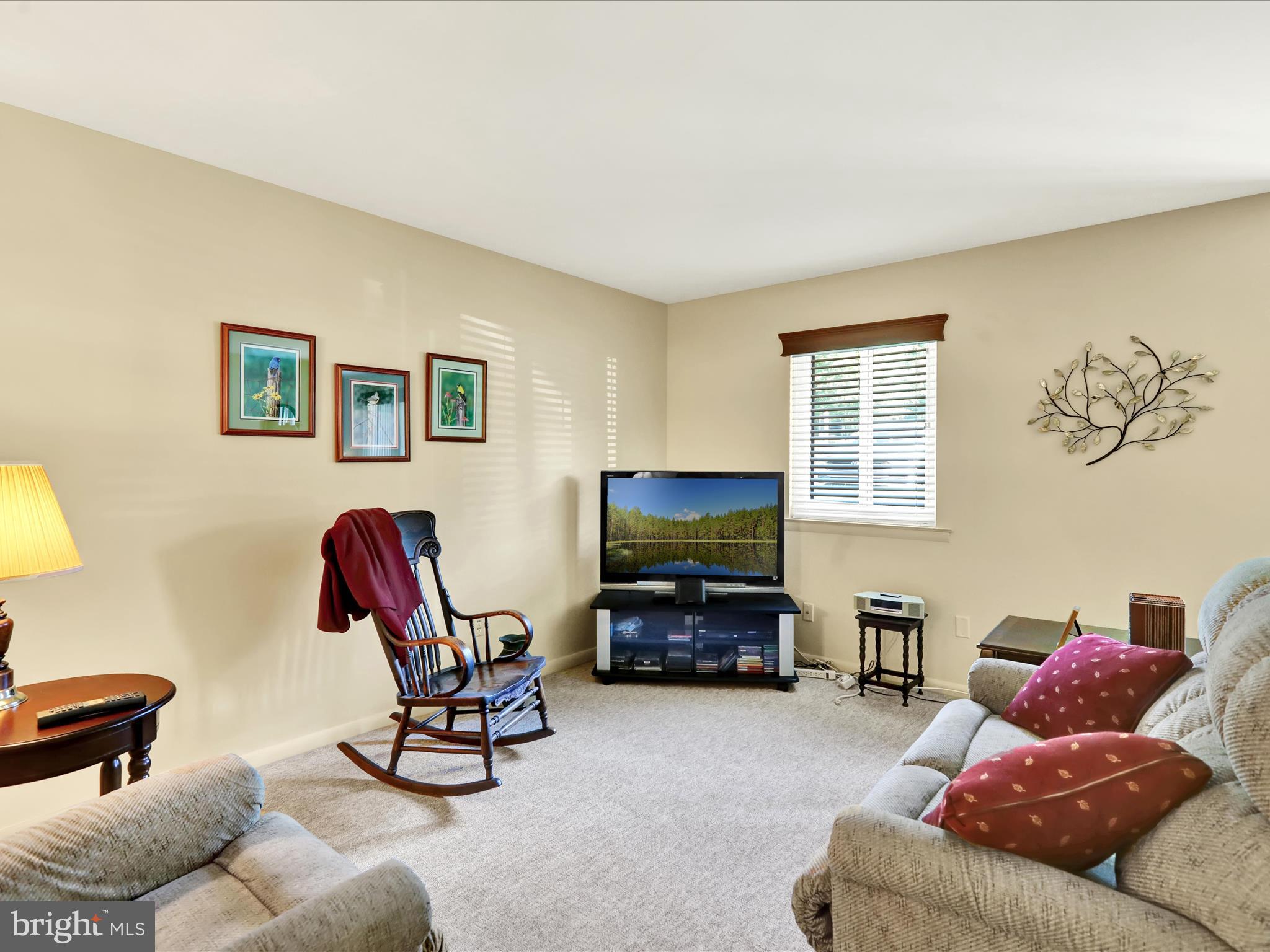 1801 Cambridge Avenue, Unit B4 Wyomissing, PA 19610 - Photo 8 of 27 a living room with furniture a couch and a flat screen tv