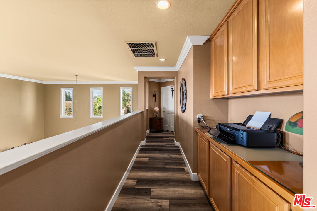 12164 Wembley Court Rancho Cucamonga, CA 91739 - Photo 15 of 42 a view of entryway and hall with wooden floor