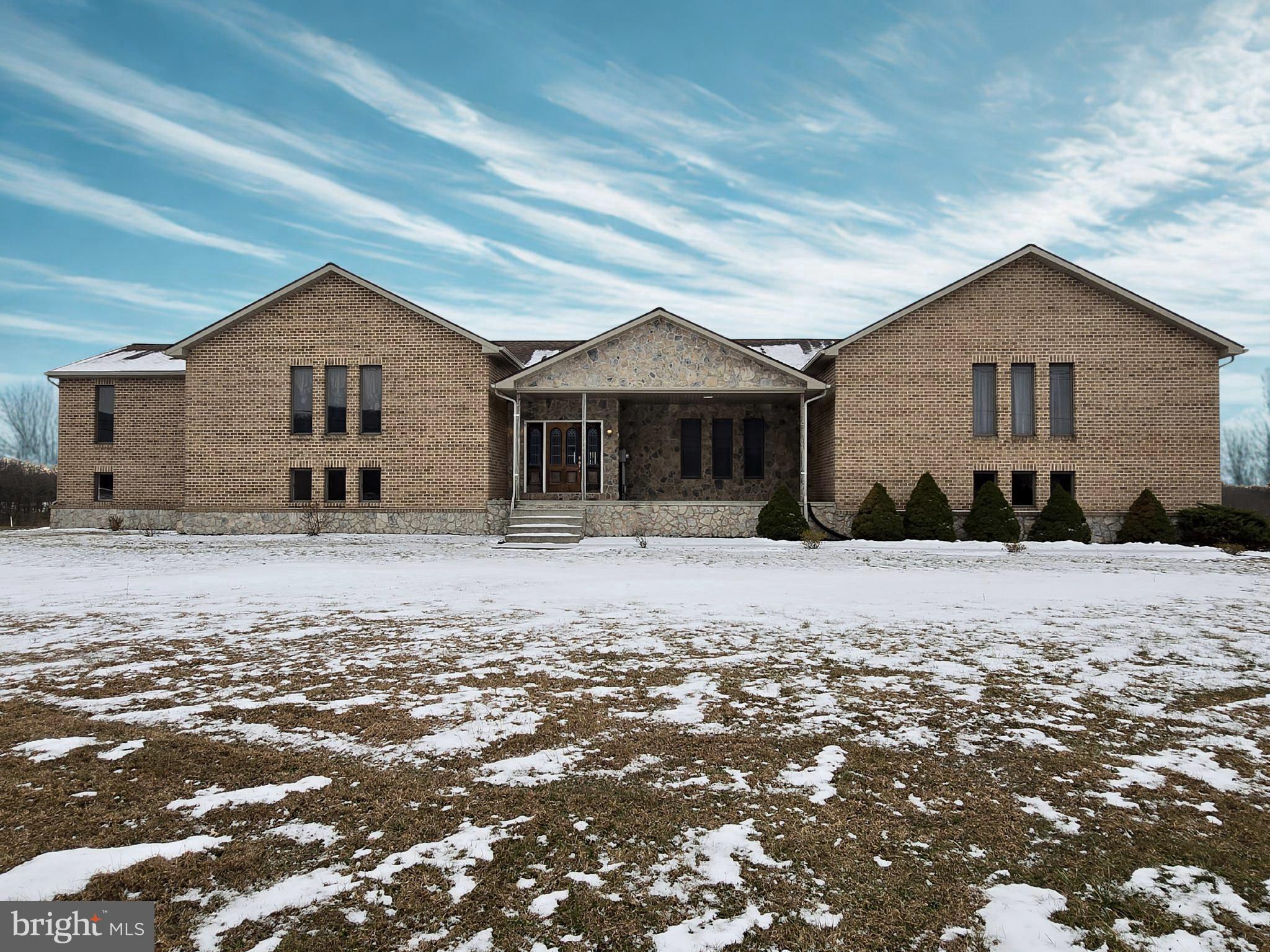 6859 Wertzville Road Enola, PA 17025 - Photo 1 of 60 a front view of a house with a yard