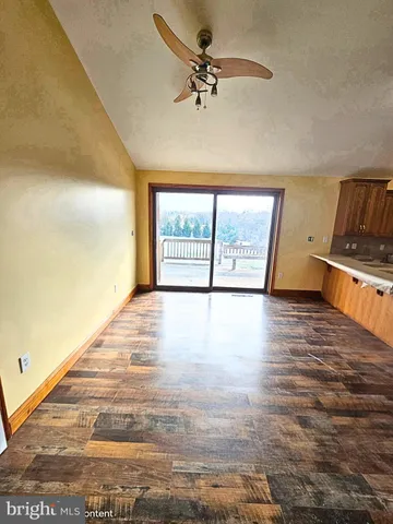 a kitchen with a refrigerator sink and microwave