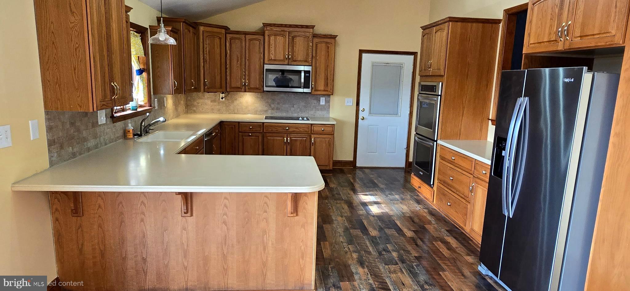 6859 Wertzville Road Enola, PA 17025 - Photo 18 of 60 a kitchen with a refrigerator sink and microwave